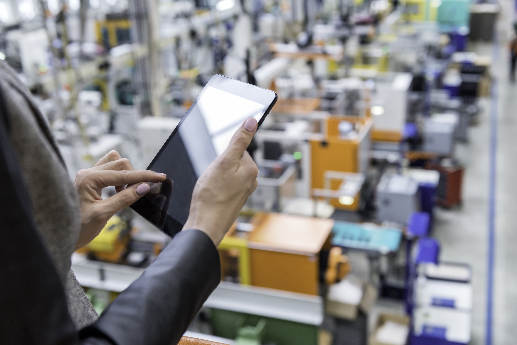Female manager working on tablet in factory IMDS Online Training